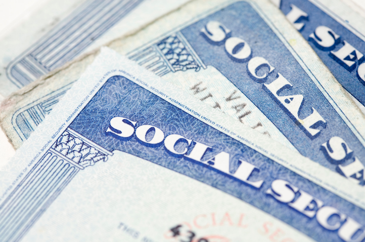 Houston retirees reviewing Social Security claiming options with an Impact! Partners Financial advisor