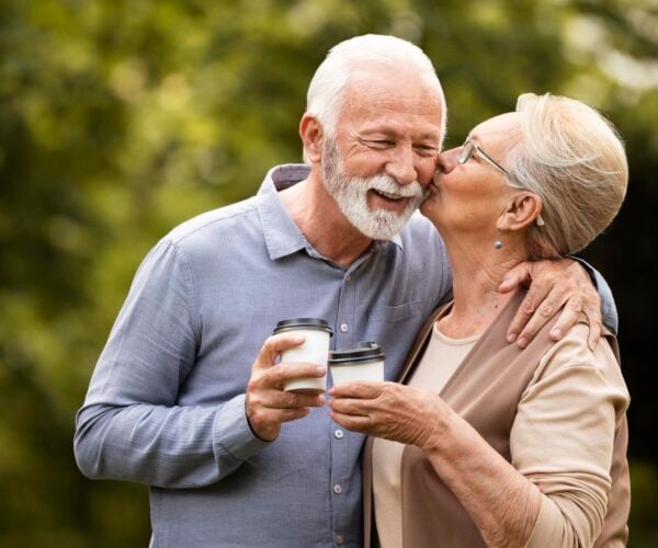 Couple with coffee cups